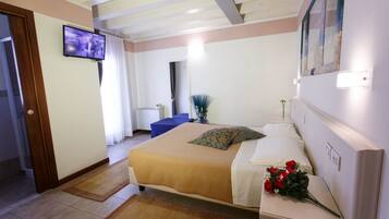 Habitació superior | Llençols de cotó egipci, roba de llit d'alta qualitat i cobrellits