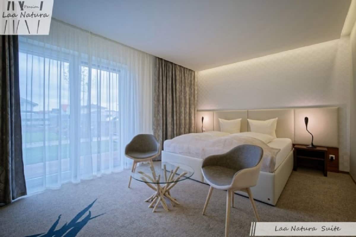 family suite, 2 bedrooms, garden view, garden area | premium bedding, minibar, in-room safe, desk