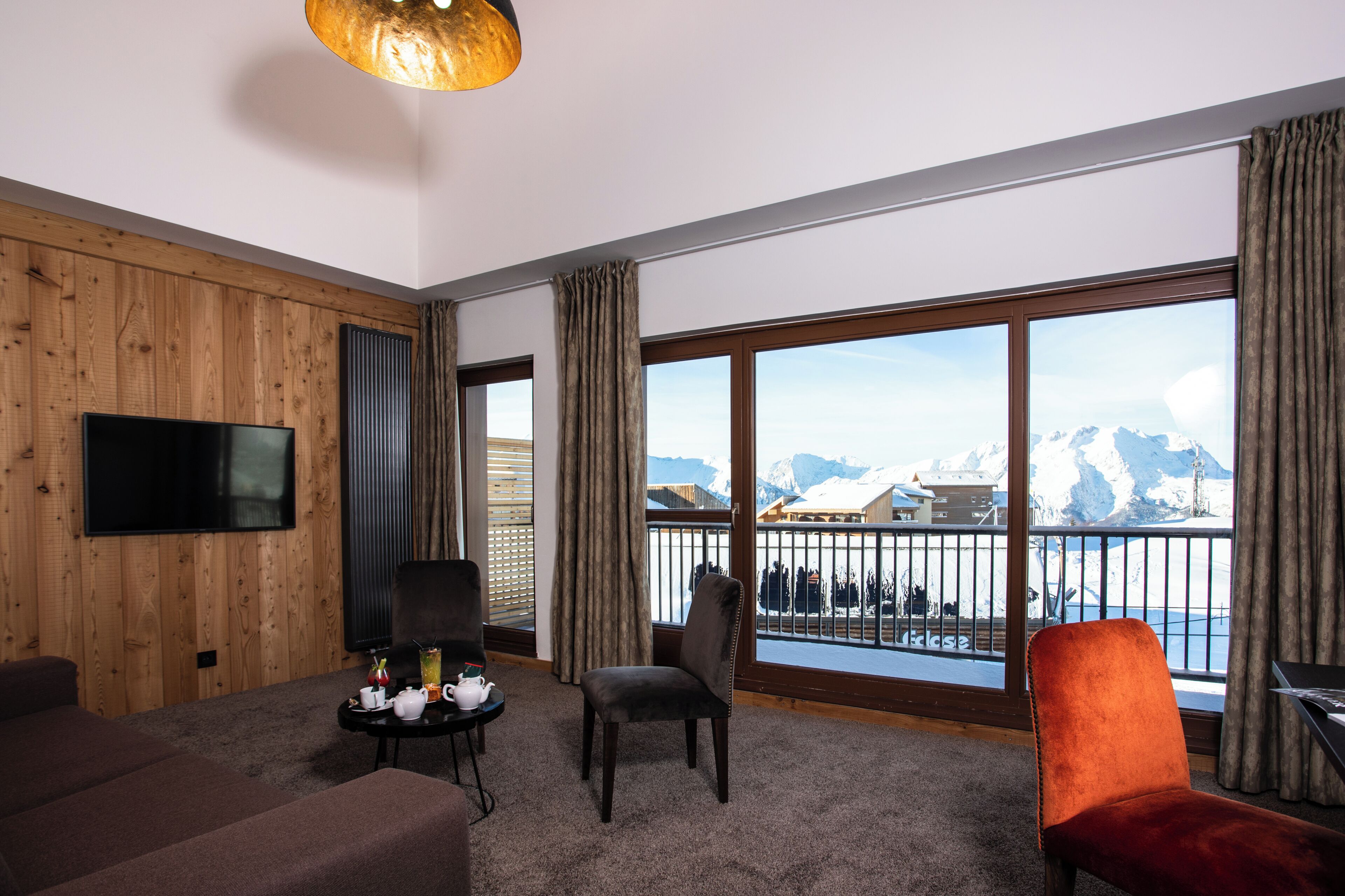 Master Suite | Coin séjour | Télévision à écran plat