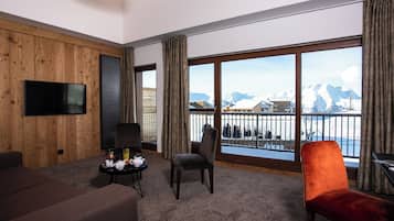 Master Suite | Coin séjour | Télévision à écran plat