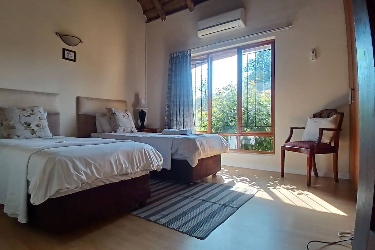 Kingfisher & Masked Weaver rooms | In-room safe, iron/ironing board, free WiFi, bed sheets