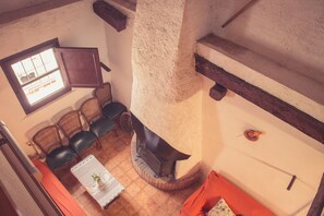 Villa | Living area | Flat-screen TV, fireplace