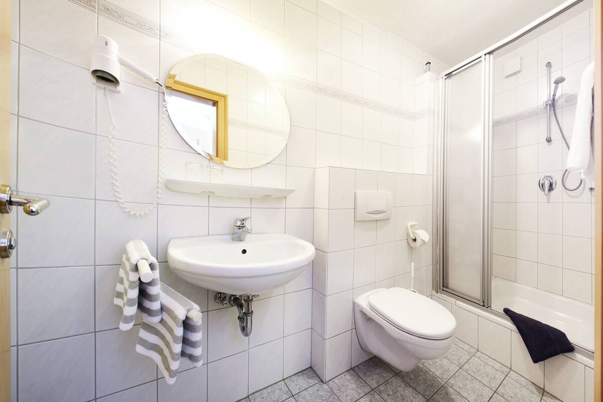 single room | bathroom | shower, hair dryer, towels