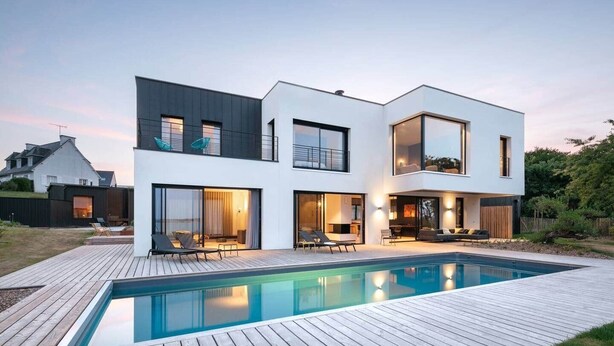 A modern two-story house with a swimming pool, large windows, and outdoor seating. - To complete (Saint-Cast-le-Guildo)