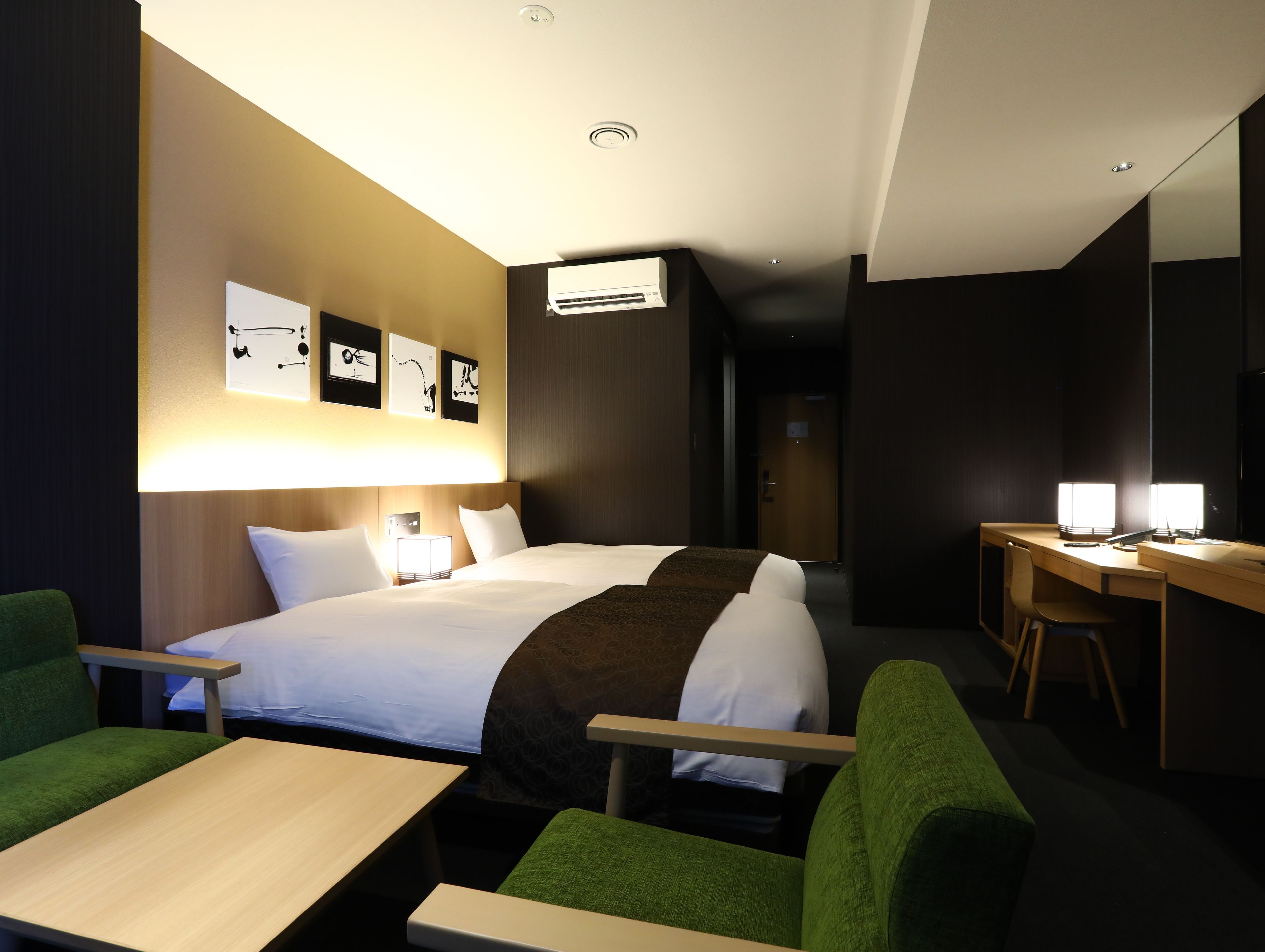 deluxe twin room for 4 guests | down duvets, memory-foam beds, individually decorated