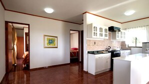 Family Cabin, 1 Bedroom, Kitchen, Garden View | Private kitchen | Full-size fridge, oven, stovetop, cookware/dishes/utensils - Honu Nui (Hanga Roa)