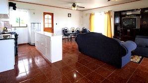 Family Cabin, 1 Bedroom, Kitchen, Garden View | Living area | Flat-screen TV - Honu Nui (Hanga Roa)