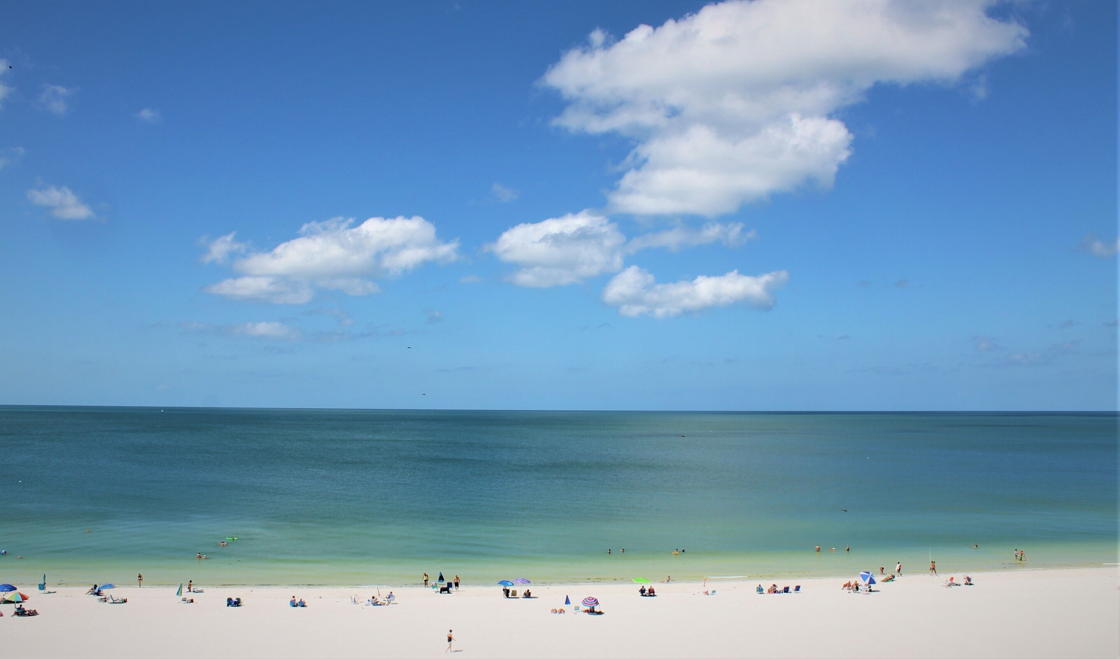 On the beach, sun loungers, beach towels