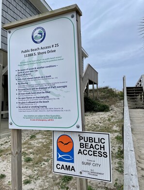 A public beach access sign with guidelines for beachgoers. - Sunset Dream - sunset view, short walk to beach (Surf City)