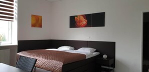 Studio Suite, 1 Bedroom, Kitchenette | Memory-foam beds, blackout curtains, free WiFi, bed sheets - Apartma Transpet (Kostelec na Hané)