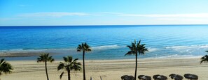 On the beach, sun loungers