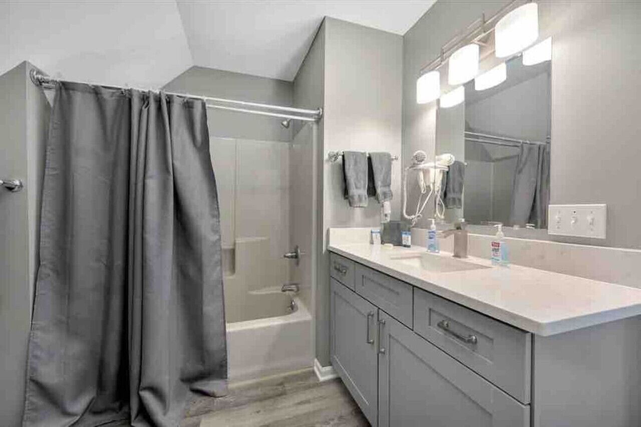 Combined shower/tub, hair dryer