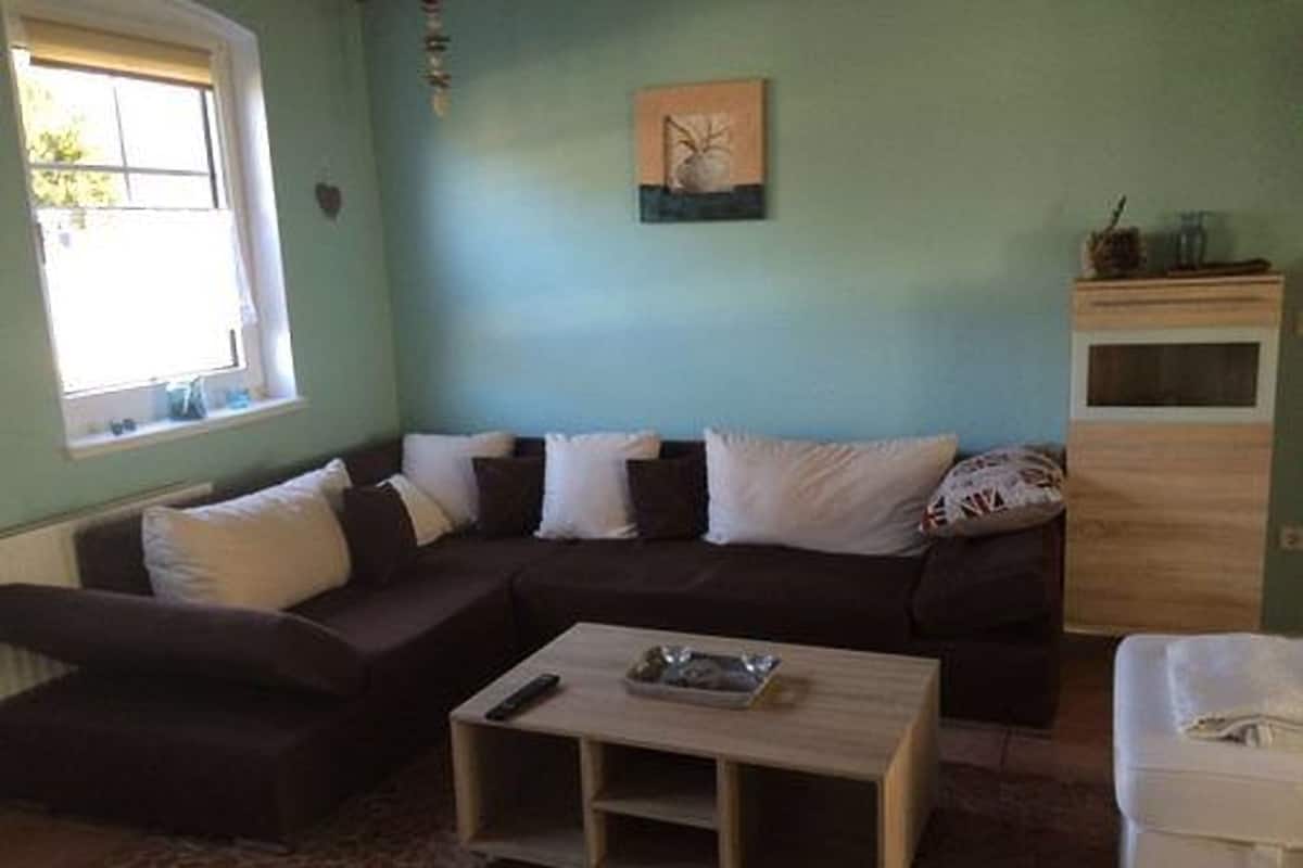 Apartment (Ferienwohnung) | Living area | Flat-screen TV