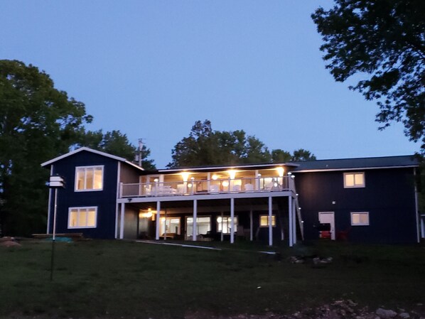 A two-story house with a balcony and a porch. - Lakefront - Gentle Slope to Water - Sleeps 18 (Shell Knob)