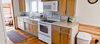 Cottage On River - close to  Torch Lake, sleeps 8