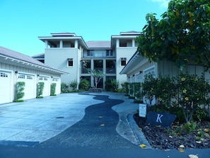 Stunning two-story building with a central entrance and landscaped area.