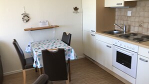 Apartamento estándar, vistas al jardín | Cocina privada