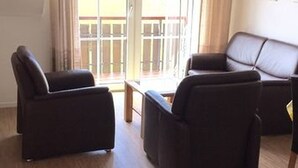 Apartamento estándar, vistas al jardín | Zona de estar