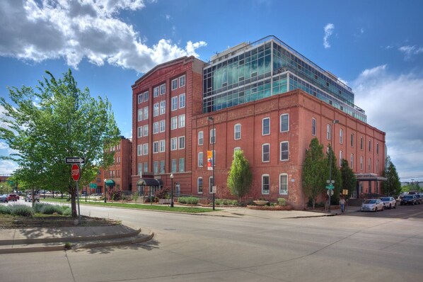 A red brick building with a modern glass extension. - In The Heart of Lower Downton Denver in a beautiful historic building. Unit 303B (Denver)