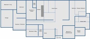 En planritning med flera sovrum, ett kök, ett badrum och ett garage.