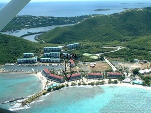 On the beach, sun-loungers, beach towels - Oceanfront Ground Floor Condo. 37 Steps to the Water (Smith Bay)