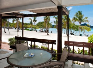 Outdoor dining - Oceanfront Ground Floor Condo. 37 Steps to the Water (Smith Bay)