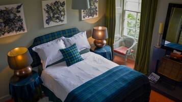 Desk, blackout curtains, iron/ironing board, bed sheets