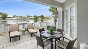 Outdoor dining - LAKEFRONT! UPDATED IN PAST 3 months ! Fish out back from porch! Minutes to beach (Miramar Beach)
