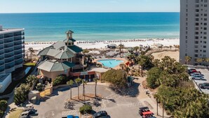 A resort with a pool, beach access, and a view of the ocean. - LAKEFRONT! UPDATED IN PAST 3 months ! Fish out back from porch! Minutes to beach (Miramar Beach)