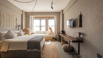 Suite | Een minibar, een kluis op de kamer, een bureau, gratis wifi