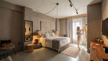 Suite, Non Smoking | Minibar, in-room safe, desk, free WiFi