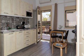 Classic Apartment, 1 Bedroom | Living area | Flat-screen TV - MiCasa (Santorini)