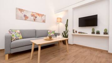 Superior Apartment, 1 Bedroom | Living room | Flat-screen TV