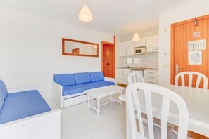 Apartment, 1 Bedroom, Balcony | Living area | Flat-screen TV - Apartamentos Llevant Puerto de Pollensa (Pollenca)