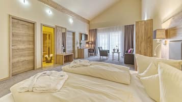 Ropa de cama hipoalergénica y tabla de planchar con plancha