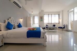 Executive-Zimmer | Verdunkelungsvorhänge, kostenloses WLAN, Bettwäsche