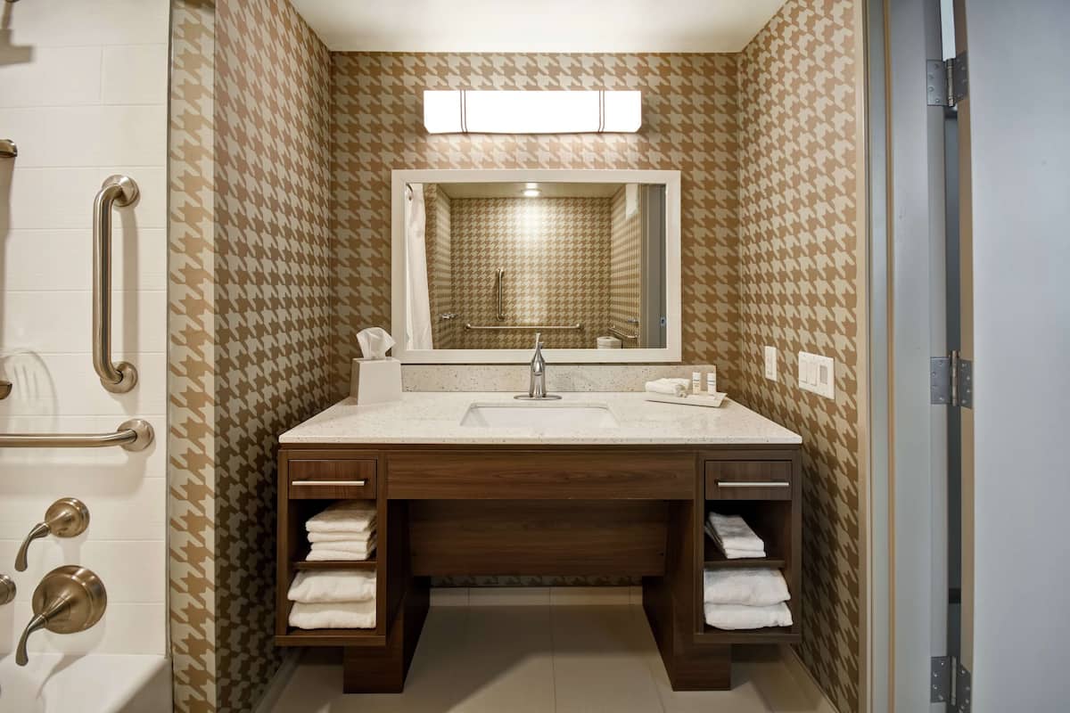 studio, 1 queen bed, accessible, bathtub | bathroom | free toiletries, hair dryer, towels, soap