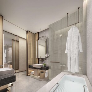 A modern bathroom with a large mirror, a bathtub, and a glass shower enclosure. - Hilton Taipei Sinban (New Taipei City)