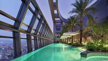 Outdoor pool, open 7:00 AM to 9:00 PM, pool umbrellas, sun loungers