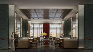A modern dining area with a central table, chairs, and a decorative centerpiece.