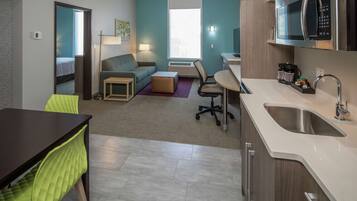 Desk, blackout drapes, iron/ironing board, cribs/infant beds