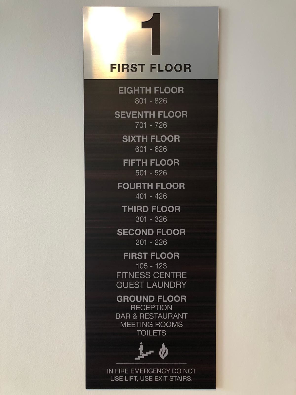 A hotel floor plan with room numbers and amenities.