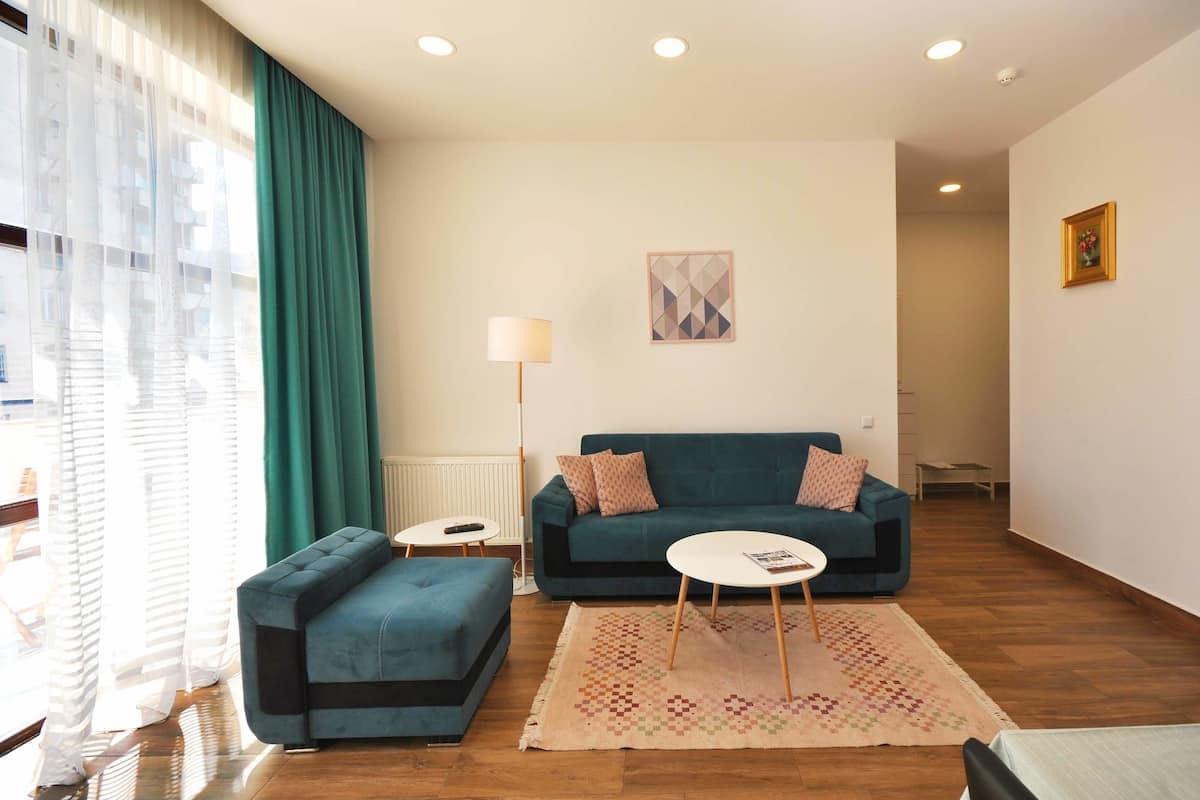 Departamento, Terraza | Escritorio, tabla de planchar con plancha, camas extra y wifi gratis 
