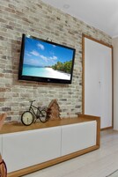 Estudio | Tabla de planchar con plancha, wifi gratis, ropa de cama