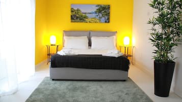 Deluxe Suite, 1 Queen Bed | Minibar, desk, laptop workspace, soundproofing