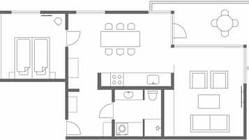 Plano de planta de una habitación de hotel con kitchenette, comedor, baño y zona de estar.