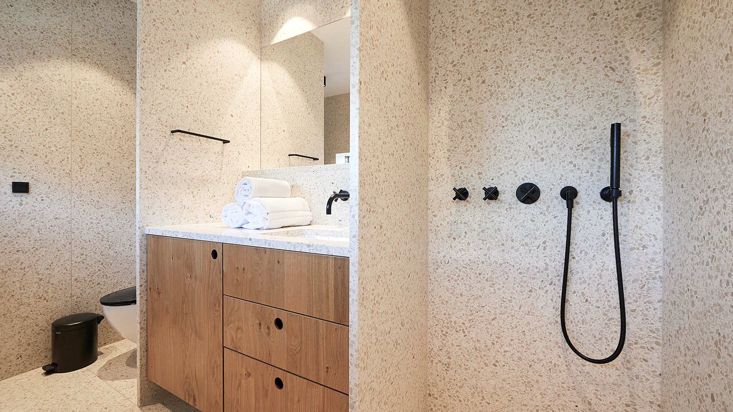 designer toiletries, hair dryer, bathrobes, towels