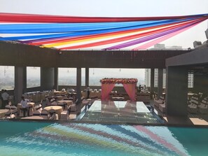 Premier Double Room Single Use, 1 King Bed, Smoking, Garden View | Mountain view - Grand Tamanna Hotel Hinjawadi Pune (Paud)