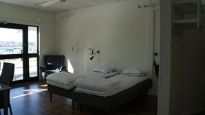 Shared apartment  1 Bedroom, Kitchenette (private WC/separate shower) | Living area - Notvikens vandrarhem (Vastervik)