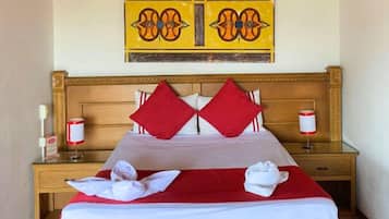 Ropa de cama de alta calidad, minibar, caja fuerte y escritorio